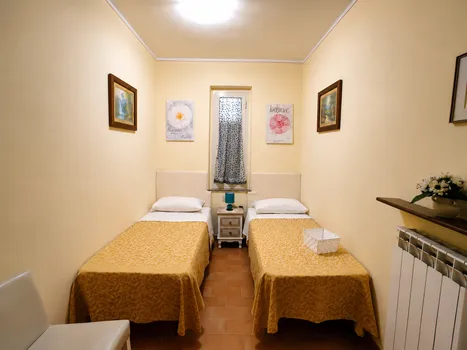 Room with two single beds at B&B Il Terrazzo